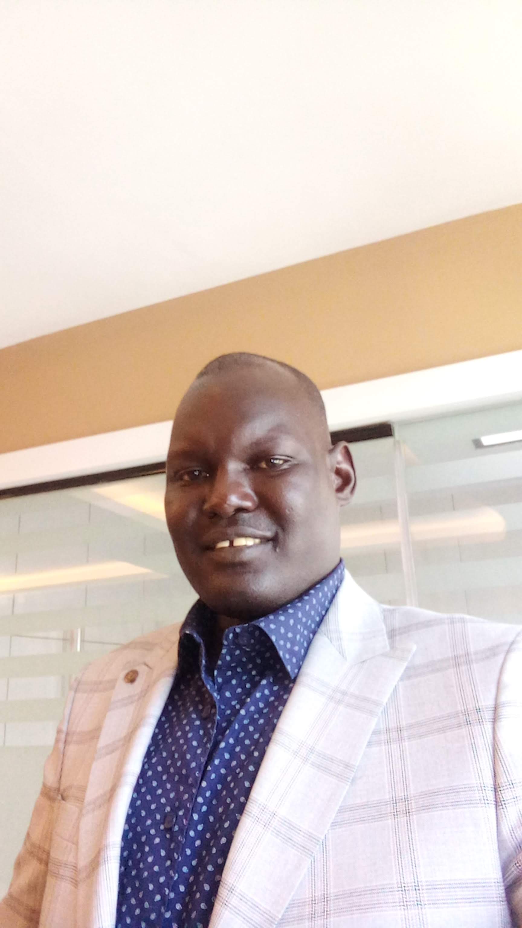 Portrait of Duot Gideon Dau, Board Chairperson of Gideon Seed Academy Ltd